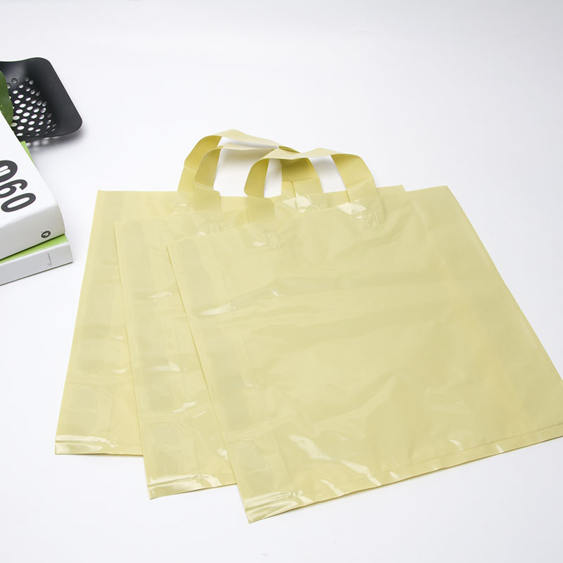 牛油果色服装店袋子女装礼品包装袋塑料手提袋纯色胶带购物袋定制