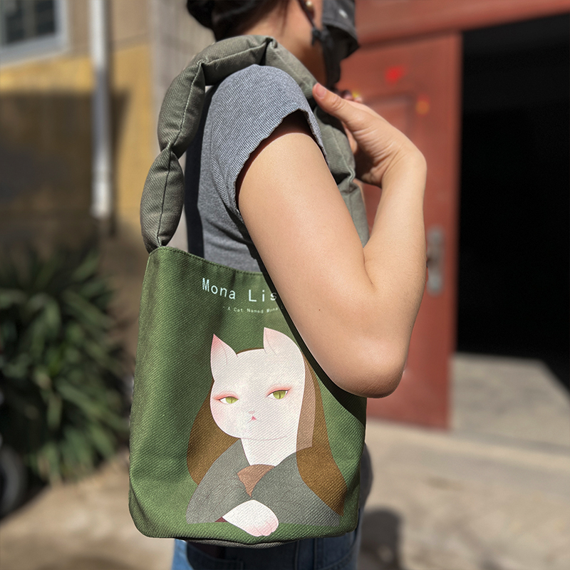 动漫世界名画原创爆改蒙娜丽莎猫小众设计马蹄包女包手提包水桶包